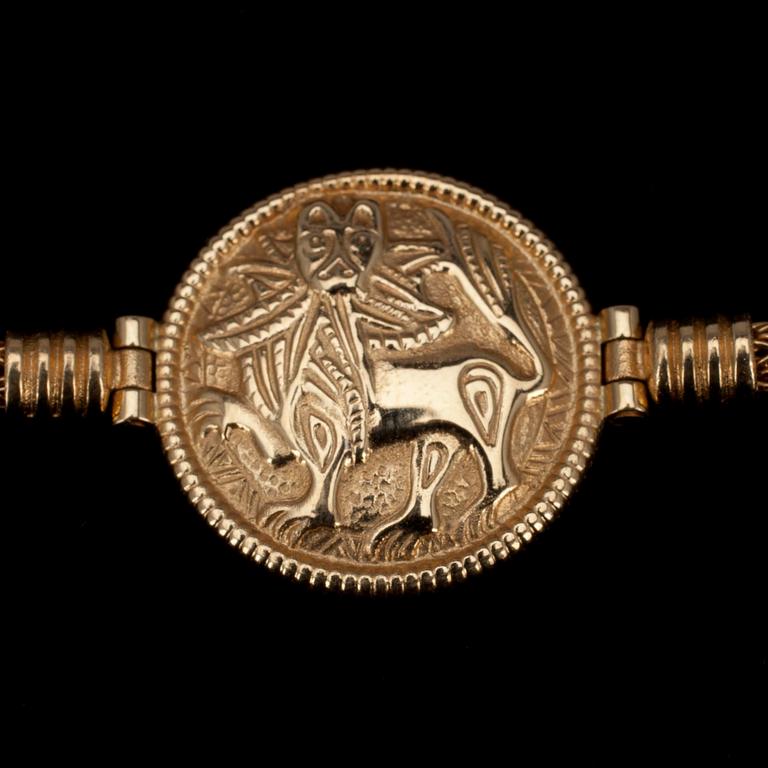 ARMBAND, guld 18K, "Sollejonet" Kalevala Koru, 1998. Vikt 16,2 g.