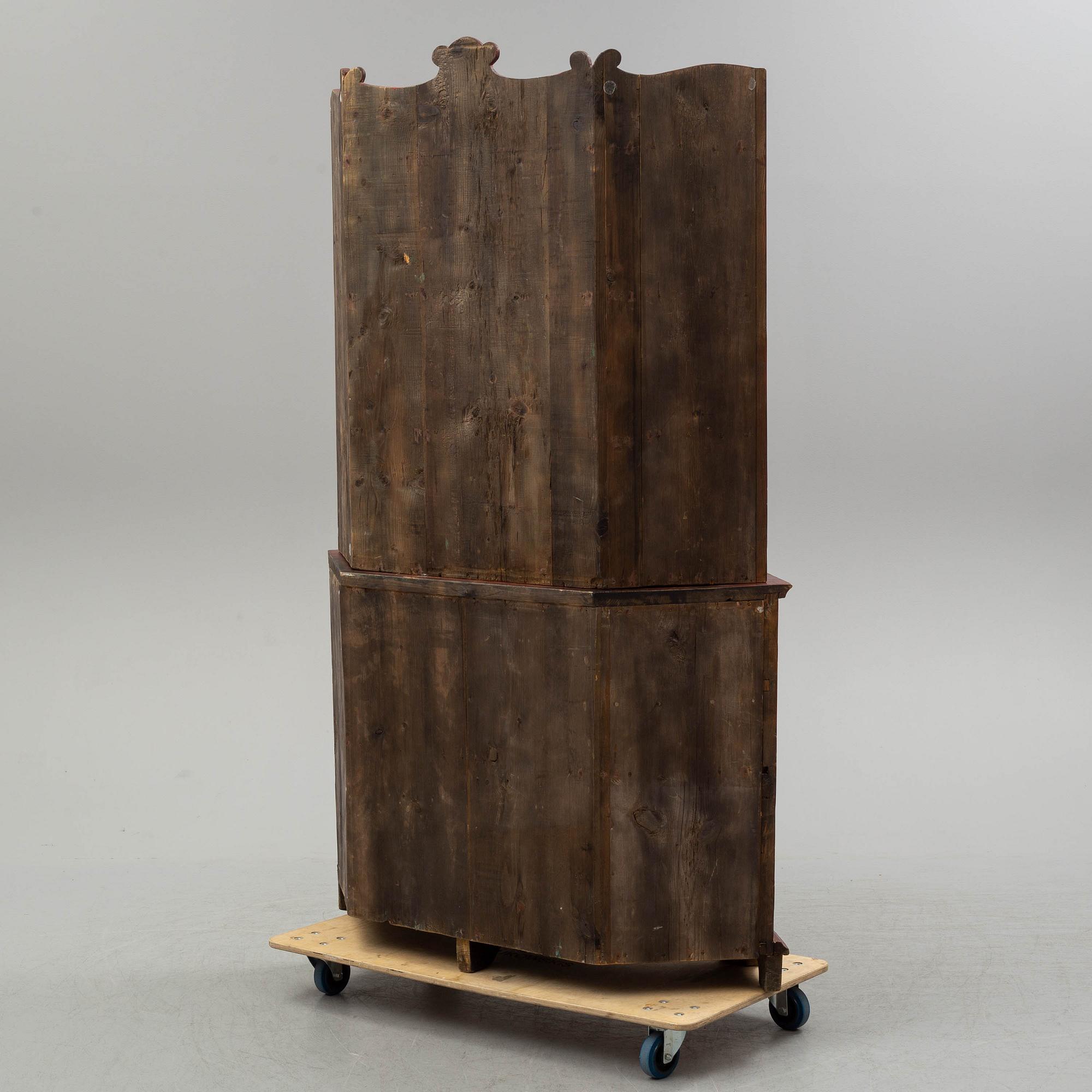 A 19th century corner cupboard.