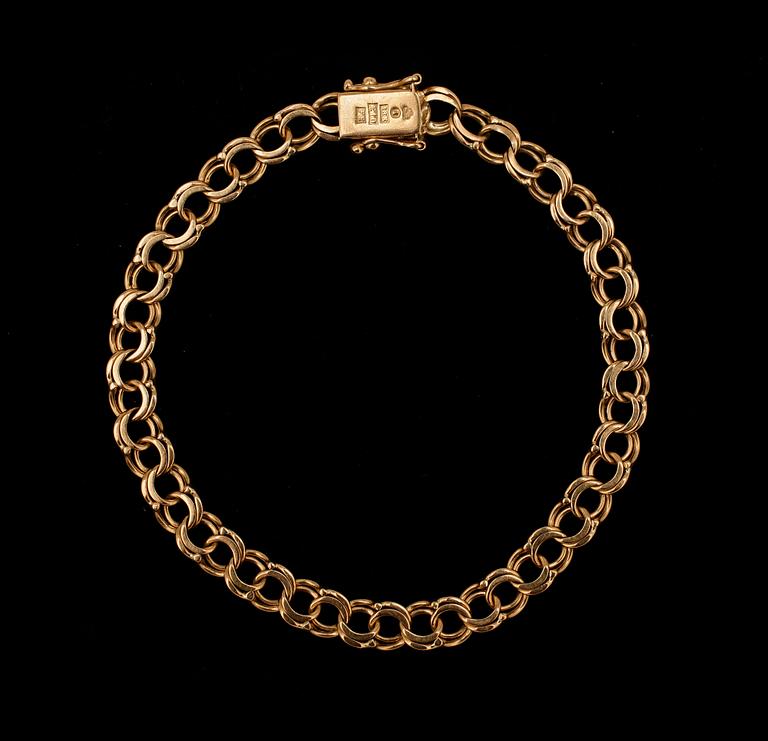 ARMBAND, 18 guld, Esto AB, Handen, 1900-talets andra hälft. Tot vikt 11g.