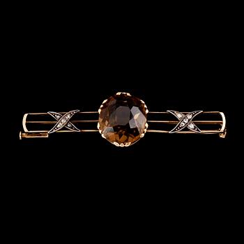 BROSCH, guld och silver, med små rosenstenar, omkring år 1900.