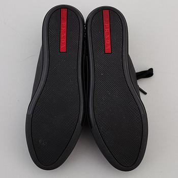 PRADA, two pairs of leather sneakers, size 35,5.