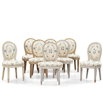 Eight Gustavian late 18th century matched chairs (7+1).