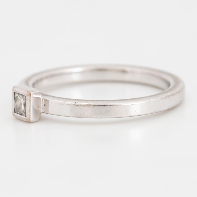 Princess-cut diamond ring.