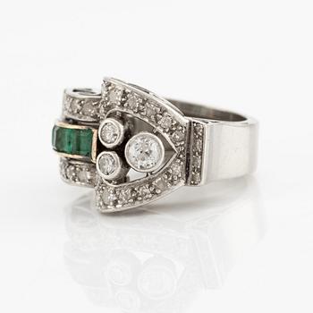 Ring, platinum with emeralds and diamonds.