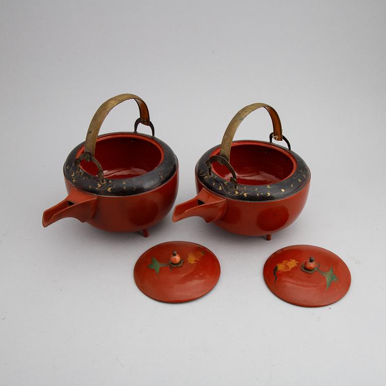 A pair of Japanese red lacquer pots, presumably Meiji (1868-1912).