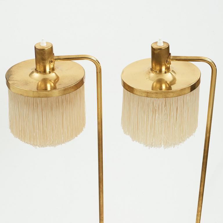 Hans-Agne Jakobsson, a pair of brass and tassel floor lamps for Markaryd AB Sweden, 1960-70's.