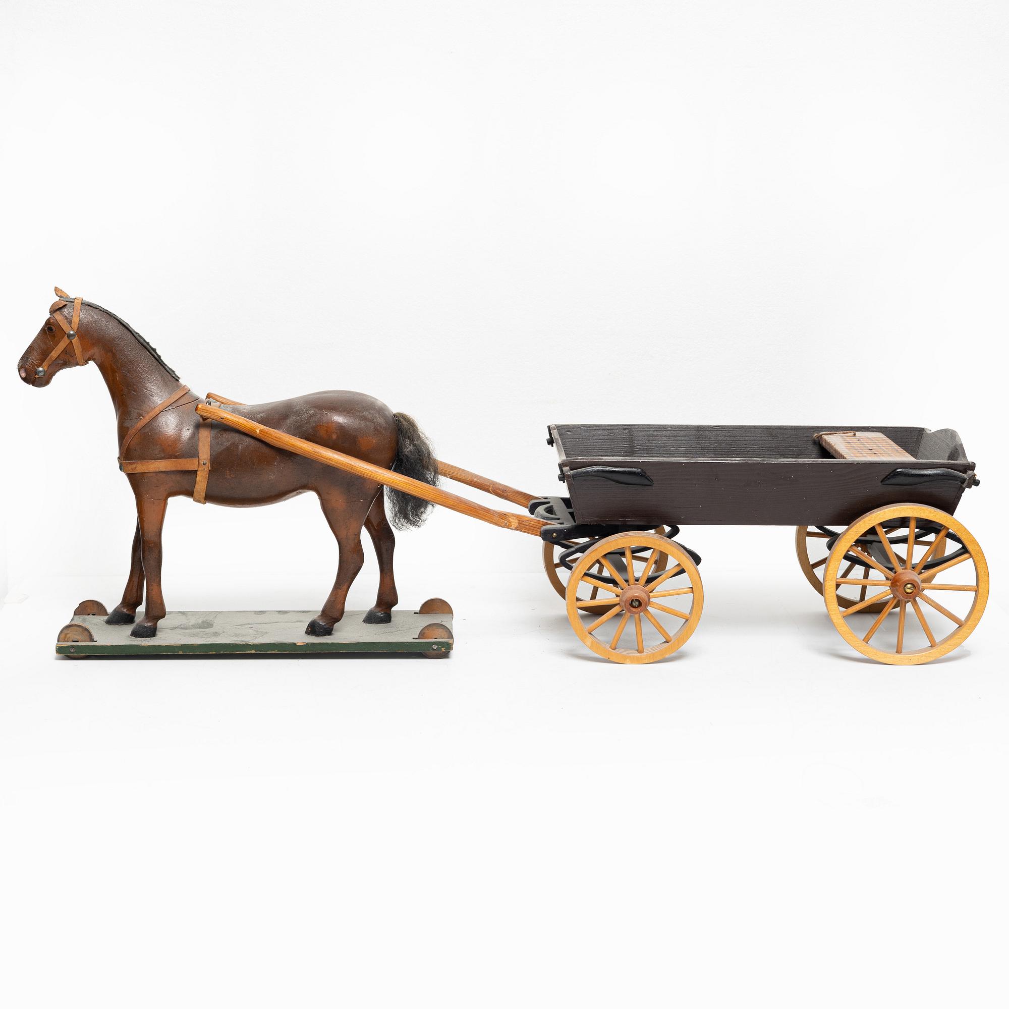 Horse-drawn carriage, early 20th century.