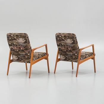 A pair of mid 20th century armchairs.