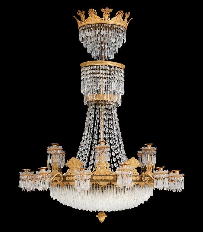 An Empire first half 19th century eighteen-light gilt bronze chandelier.