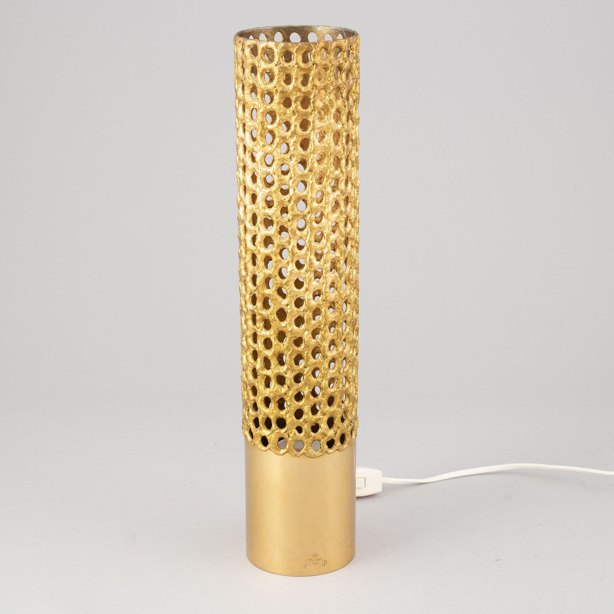 A brass table lamp by Pierre Forssell, second half of the 20th Century.