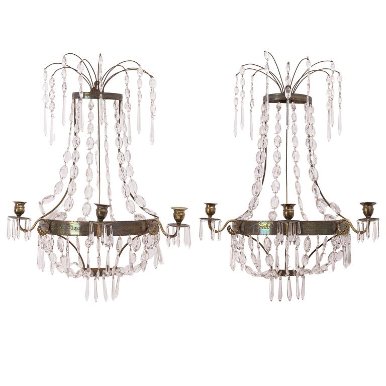Wall lights, a pair, for three candles, 19th century, Empire style.