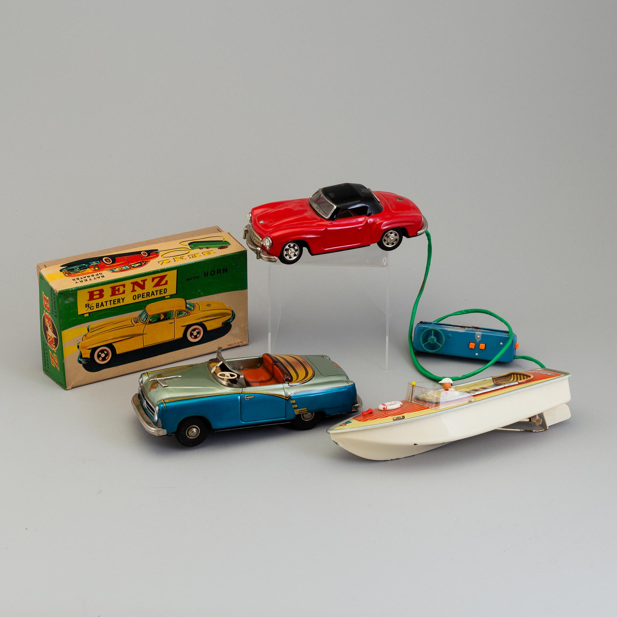 THREE TIN PLATE TOYS, mid 20th century.