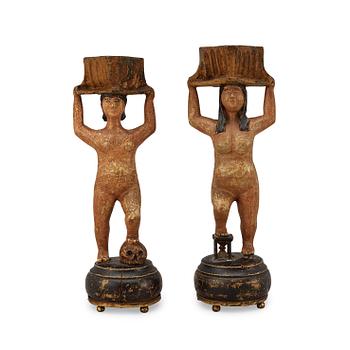 1621. A pair of Swedish 19th century wooden candlesticks.