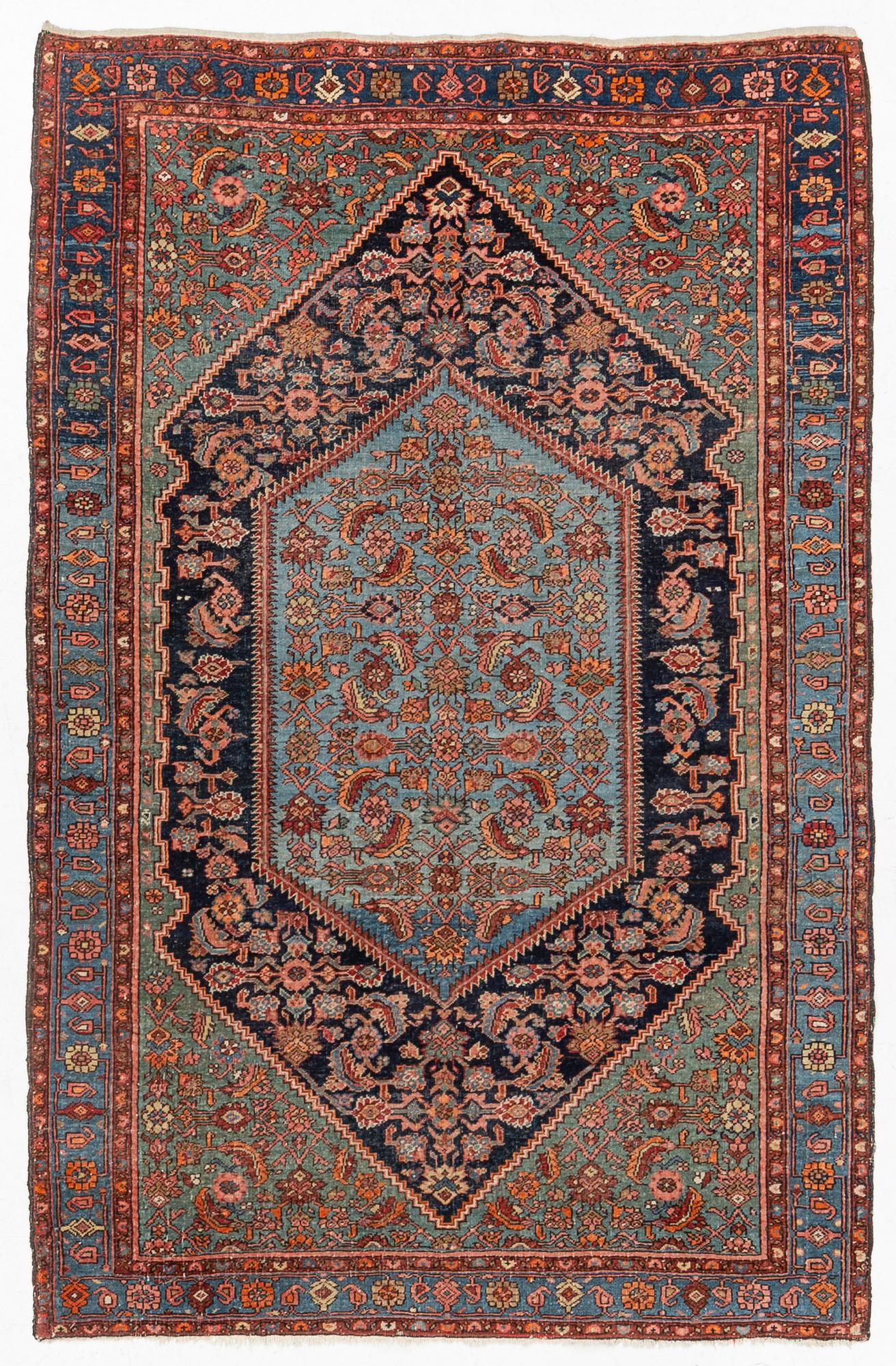 A carpet, semi-antique Hamadan, c. 199 x 128 cm.