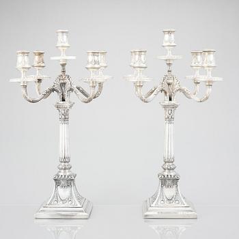 A pair of Swedish silver candelabras, mark of Svea Svensson, Stockholm 1908.