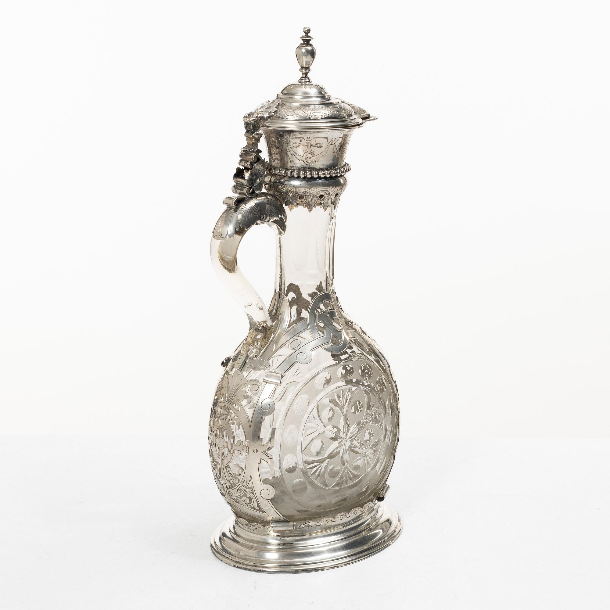 Decanter/wine jug in glass, with mount, possibly silver, early 20th century.