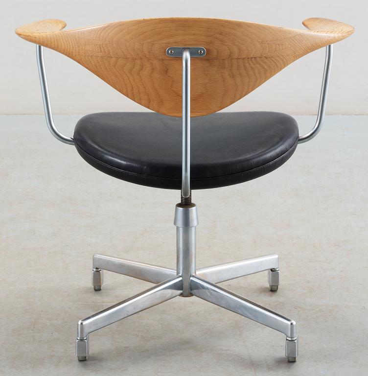 A Hans J Wegner 'Swivel chair', Johannes Hansen, Denmark circa 1960.