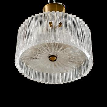 TAKLAMPA, glas och mässing, Carl Fagerlund, Orrefors. Höjd ca 20 cm.