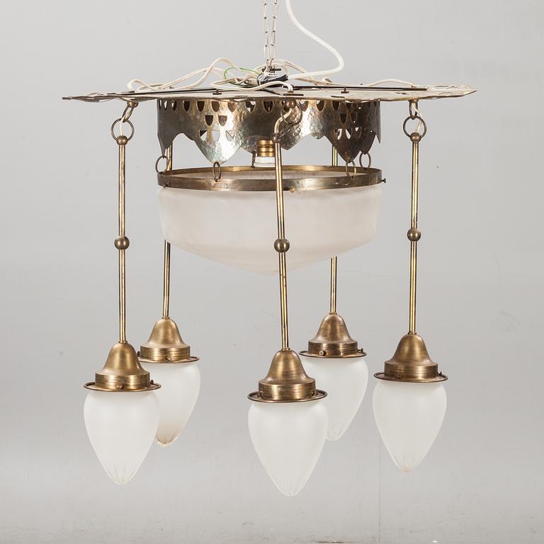TAKLAMPA, jugend. 1900-talets början.
