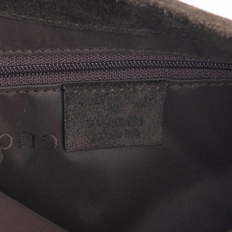 Gucci, a Bamboo suede bag.