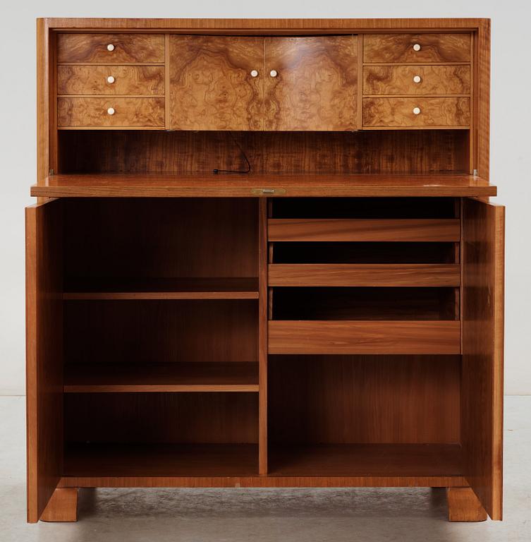 A walnut secretaire attributed to Carl Bergsten, Sweden 1920-30's.