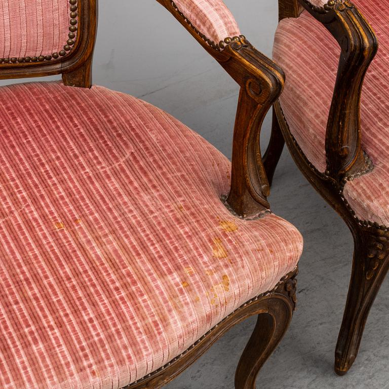 A pair of 19th-century rococo revival arm-chairs.