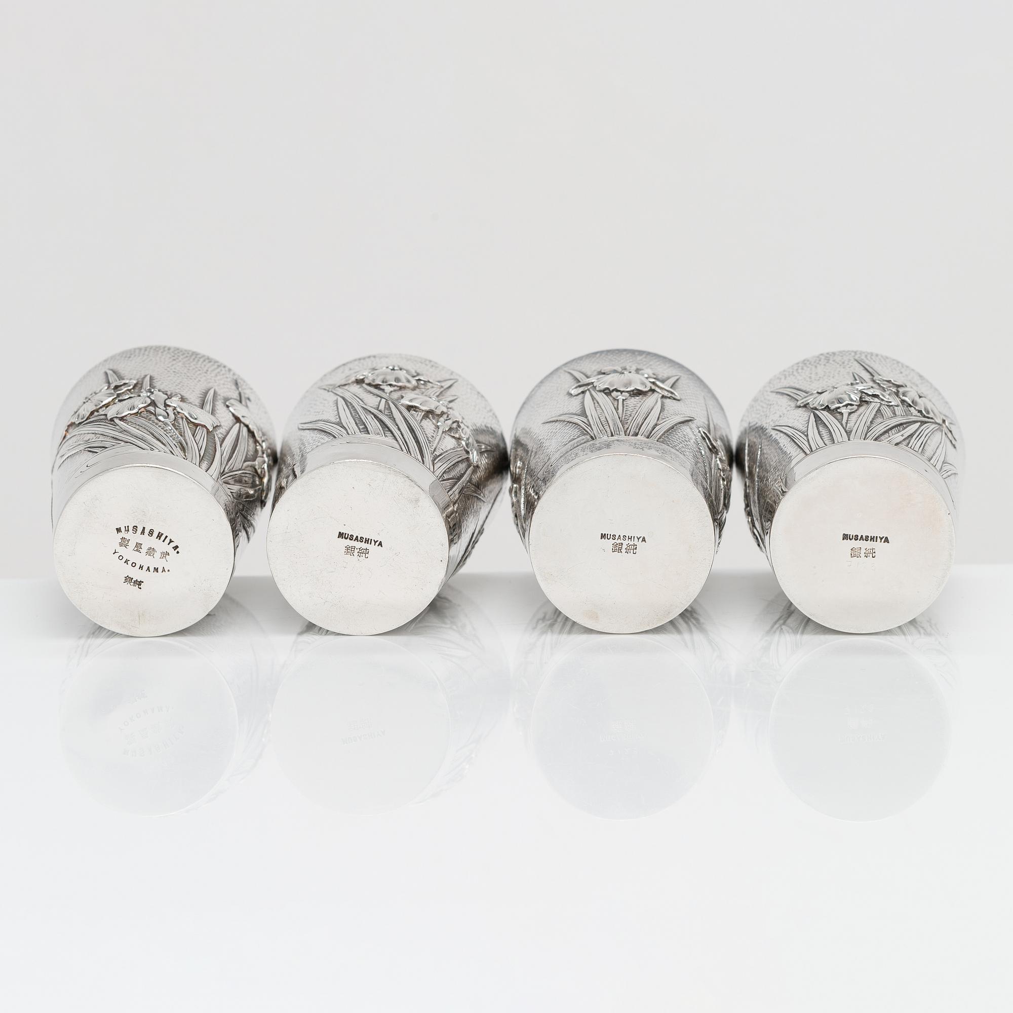 A set of four silver beakers, maker's mark of Musashiya, Yokohama. Late Meiji, early 20th century.