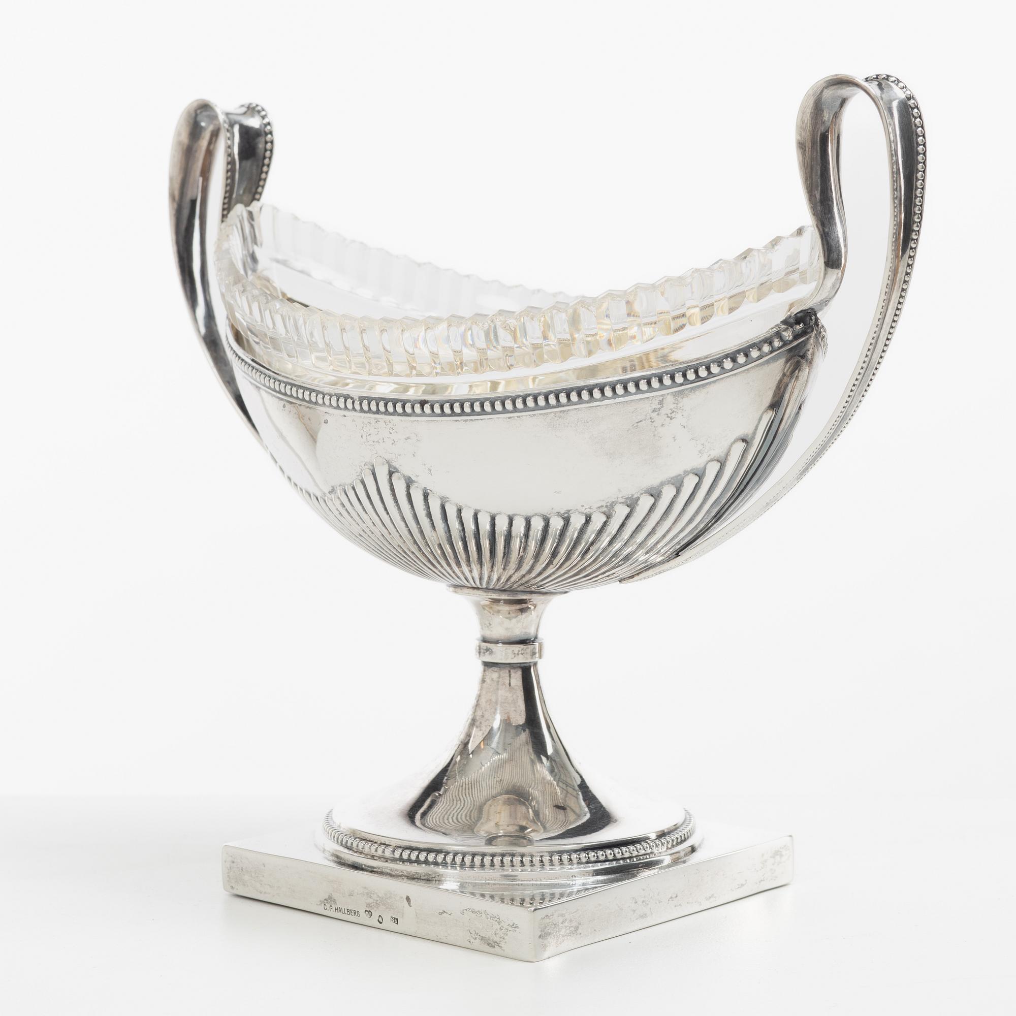 C.G. Hallberg, A Swedish silver sugar bowl with glass insert, mark of CG Hallberg, Stockholm 1896.