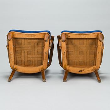 Einari Kyöstilä, A pair of 1940s armchairs for Oy Stockmann Ab,  Keravan Puusepäntehdas, Finland.