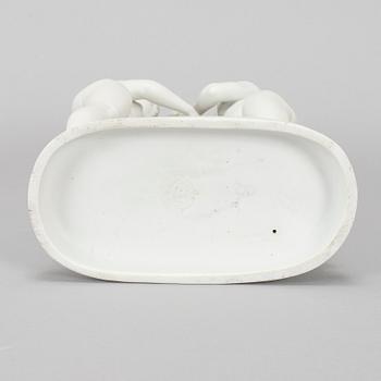 A porcelain figurine, Three Graces.