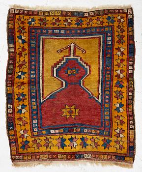 An antique prayer rug, central Anatolia, c.. 92 x 77 cm.