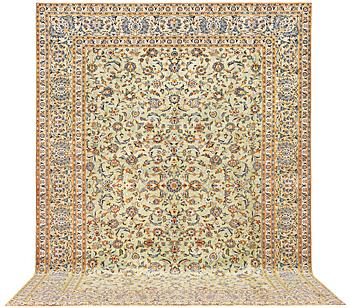 A Kashan carpet, a. 420 x 305 cm.