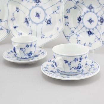 76 pieces of porcelain tableware from Royal Copenhagen in Denmark, model "Musselmalet", second half of the 20th century.