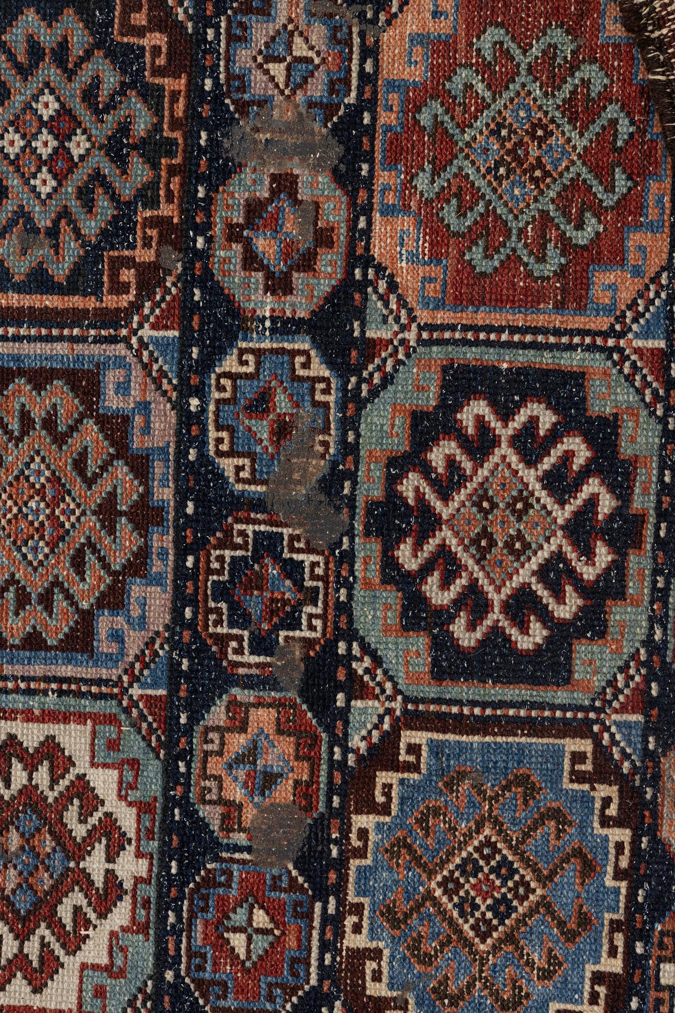 A Northwest Persian antique rug, c. 166 x 106 cm.