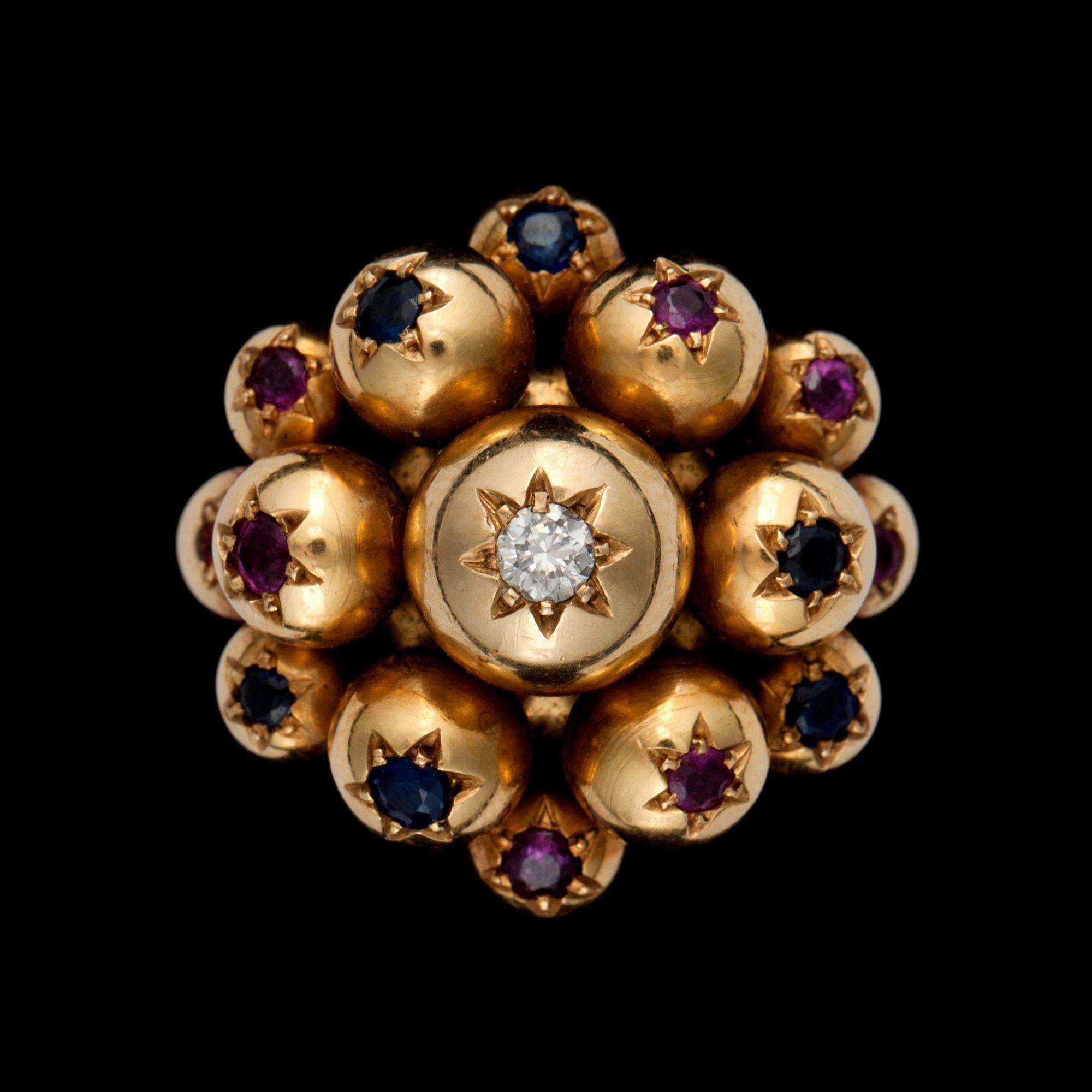 A ruby, sapphire and diamond ring.