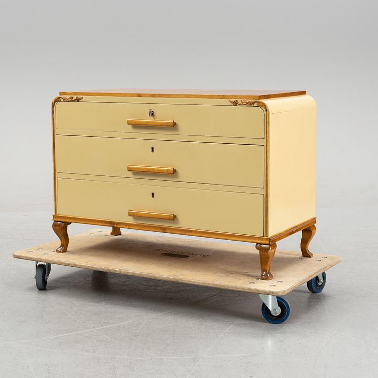 An elm veneeded chest of drawers, 1940's.