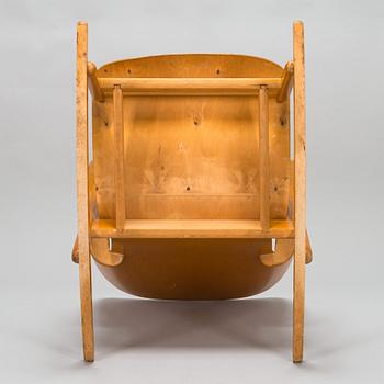 Ilmari Tapiovaara, a 1940s 'Domus' rocking chair for Keravan Puuteollisuus.