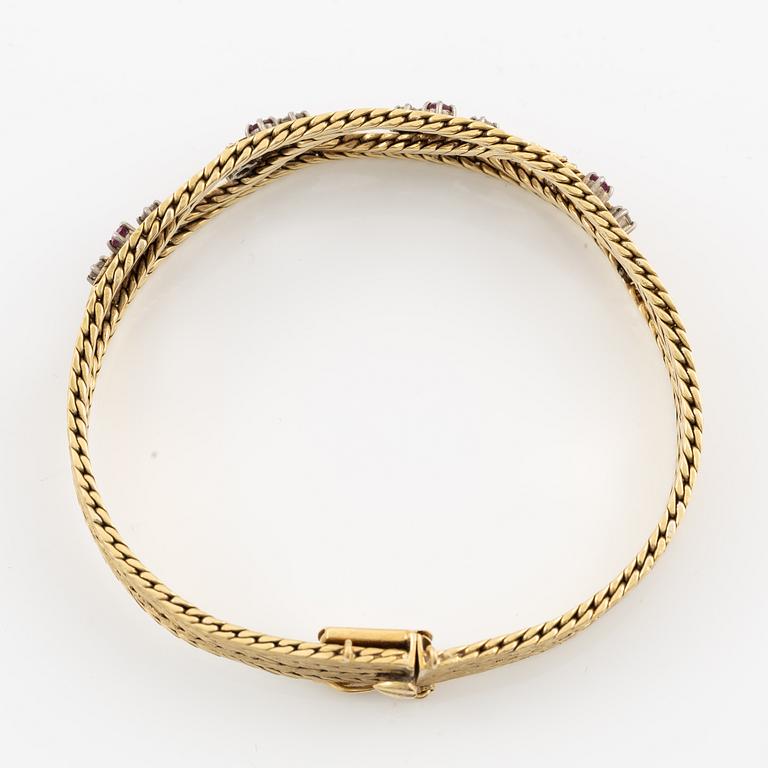 Armband 18K guld med rosa safirer och briljantslipade diamanter.