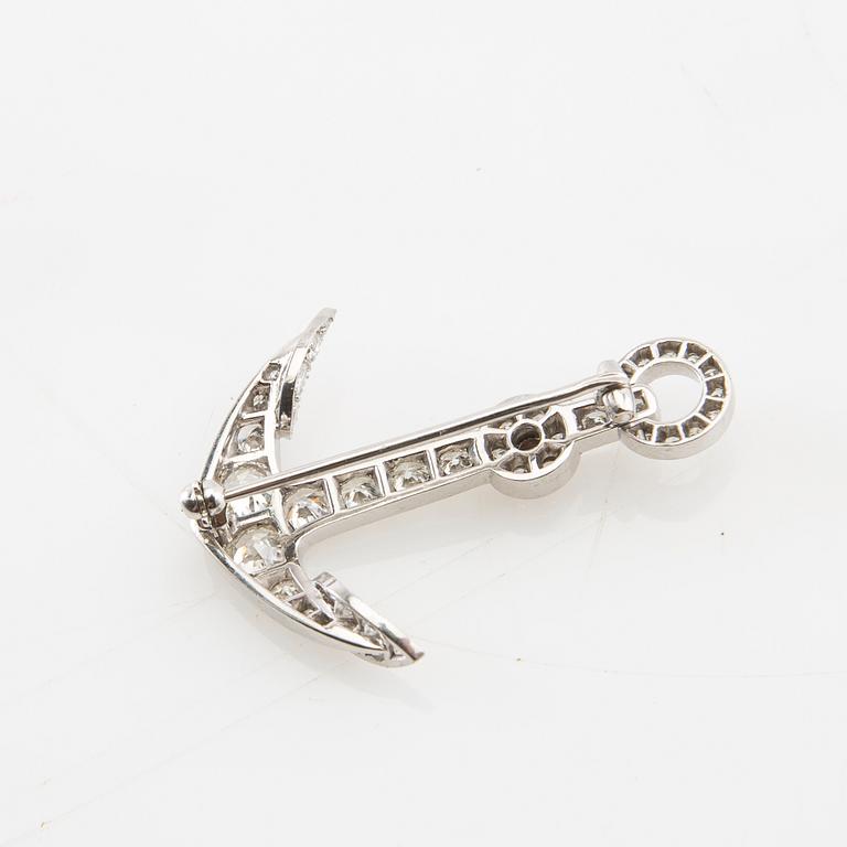 Brooch in the form of an anchor made of 18K white gold with diamonds.