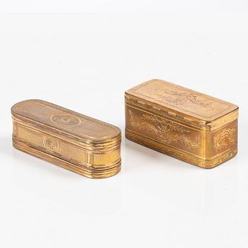 Two gilt-copper snuff boxes, France, 18th century.