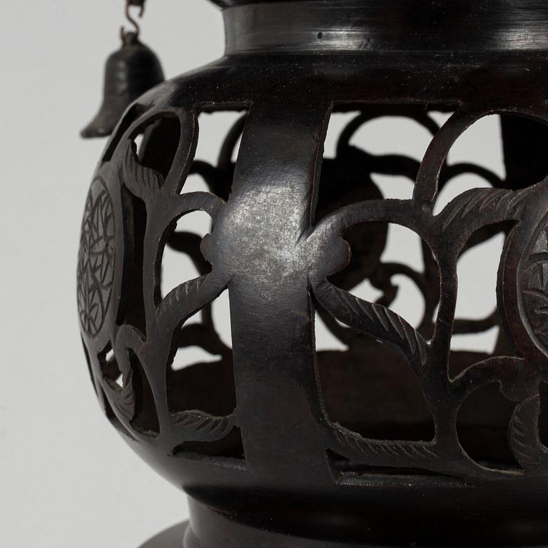 A 20th century Japanese bronze light holder pagoda.