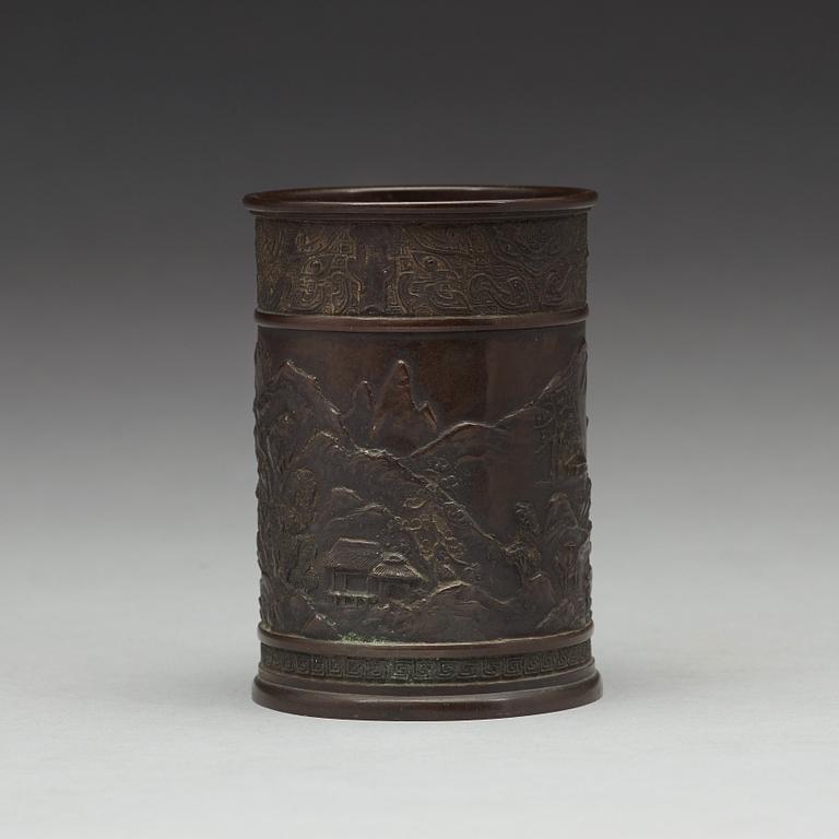 A bronze brush pot, Qing dynasty, circa 1900.