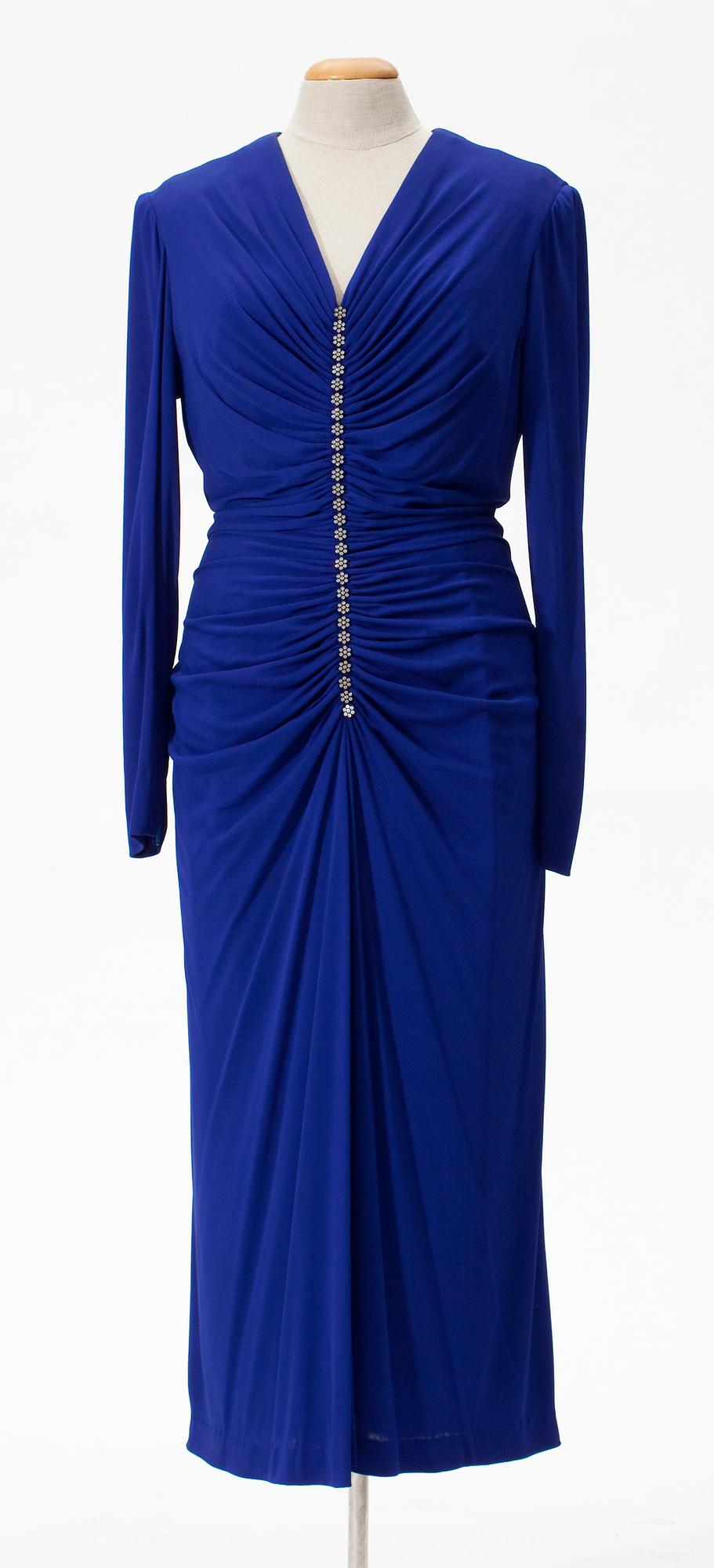 A 1980's cocktail dress with shawl.