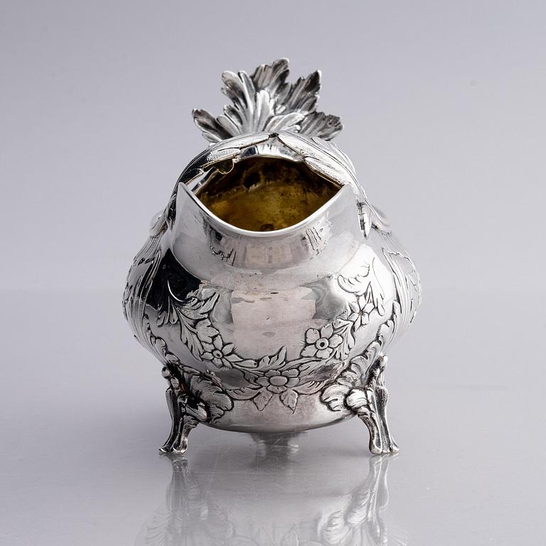 A Swedish Rococo 18th century parcel-gilt silver cream-jug, mark of Johan Abbelin, Gothenburg 1774.
