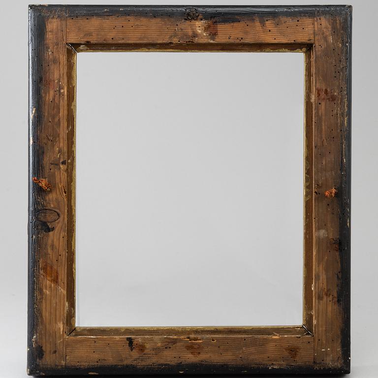 An 18th century wooden frame.