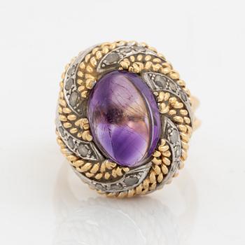 Cabochon cut amethyst and rose cut diamond ring.