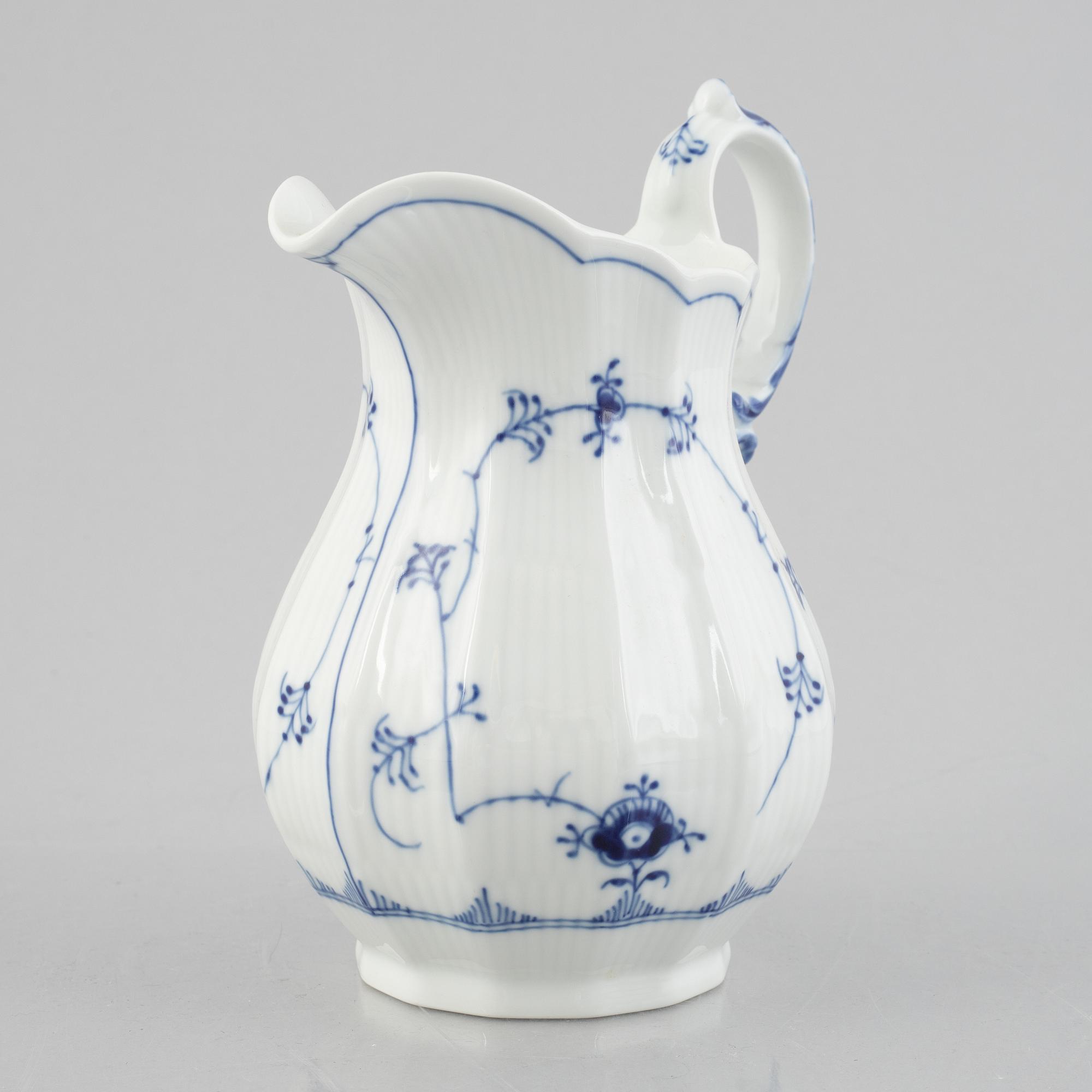 A 'Blue Fluted Plain' / 'Musselmalet rifflet' pitcher, Royal Copenhagen, model 355, 1969-73.
