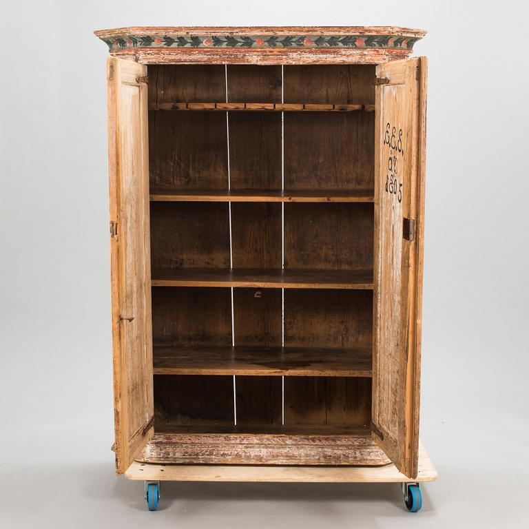 A 1805 dated cupboard marked EES ÅT.