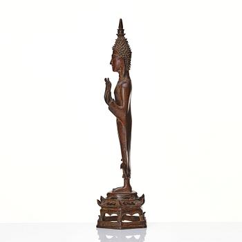 A standing sculpture of buddha, Laos, 18th Century.