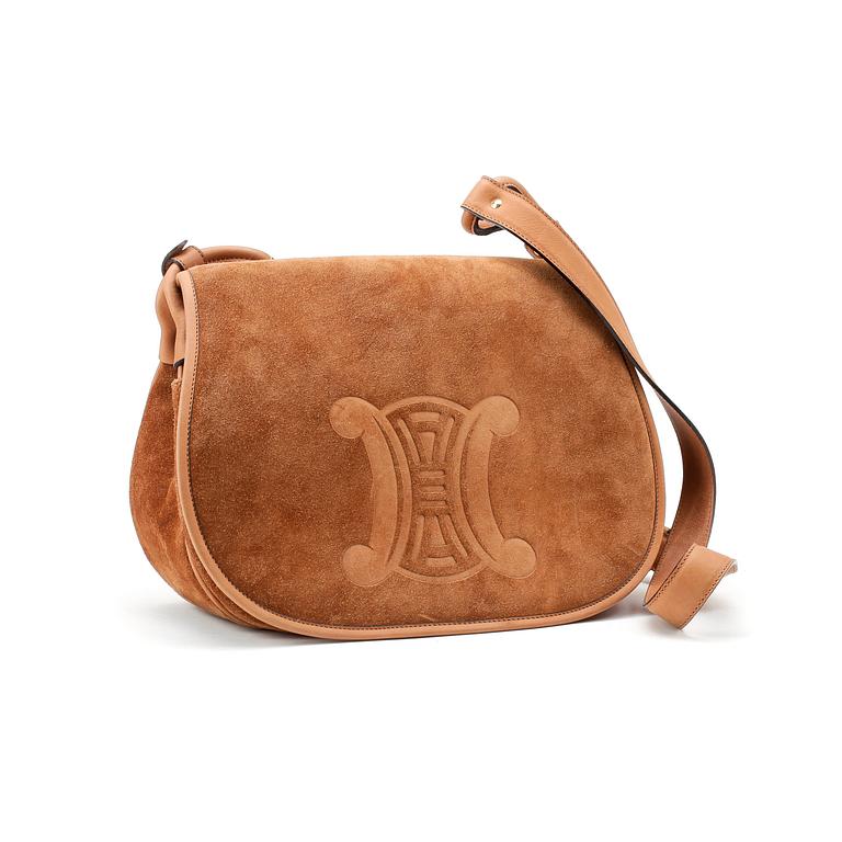 CÈLINE, a brown suede shoulder bag.